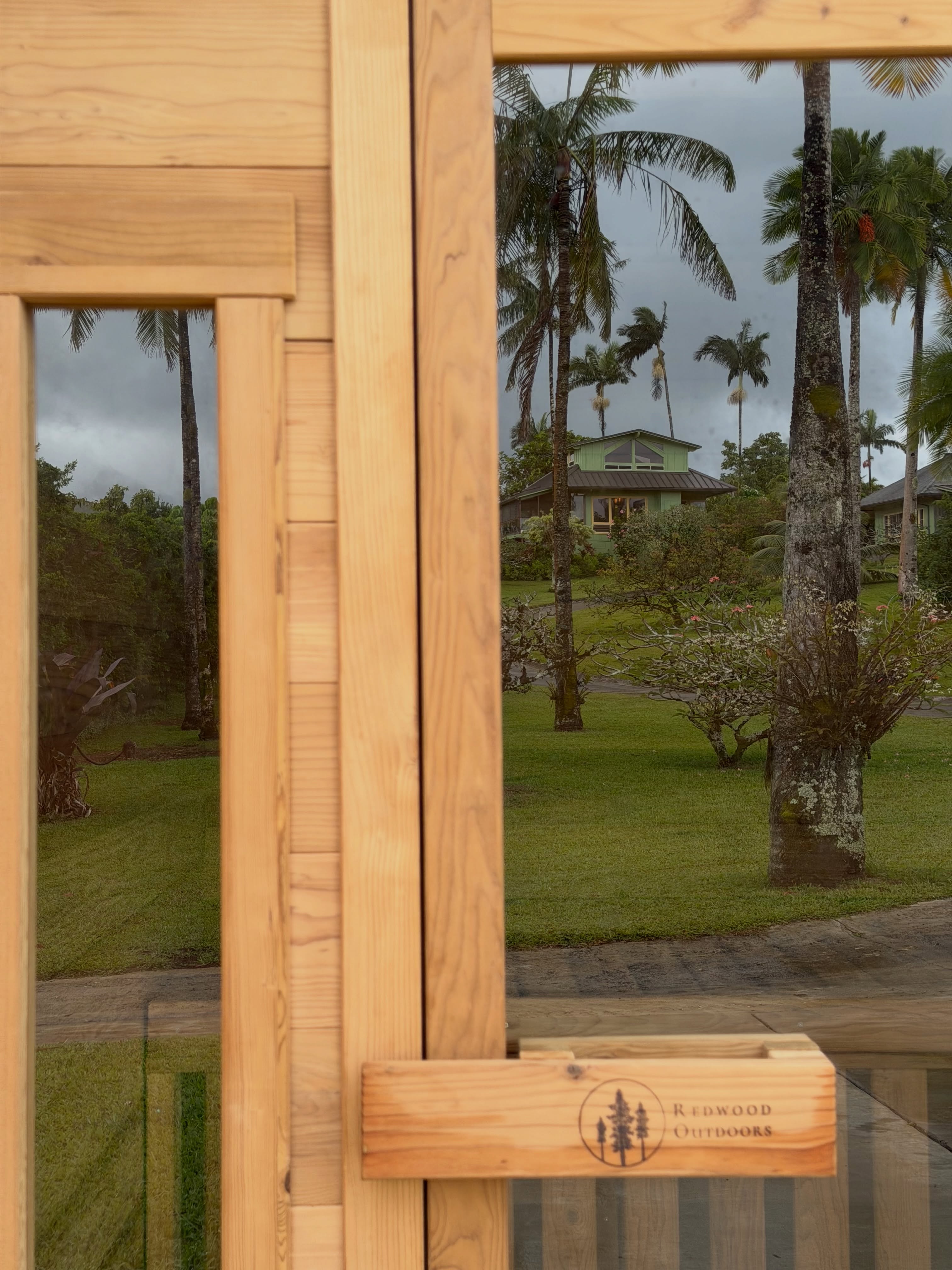 View of campus houses through the redwood sauna door